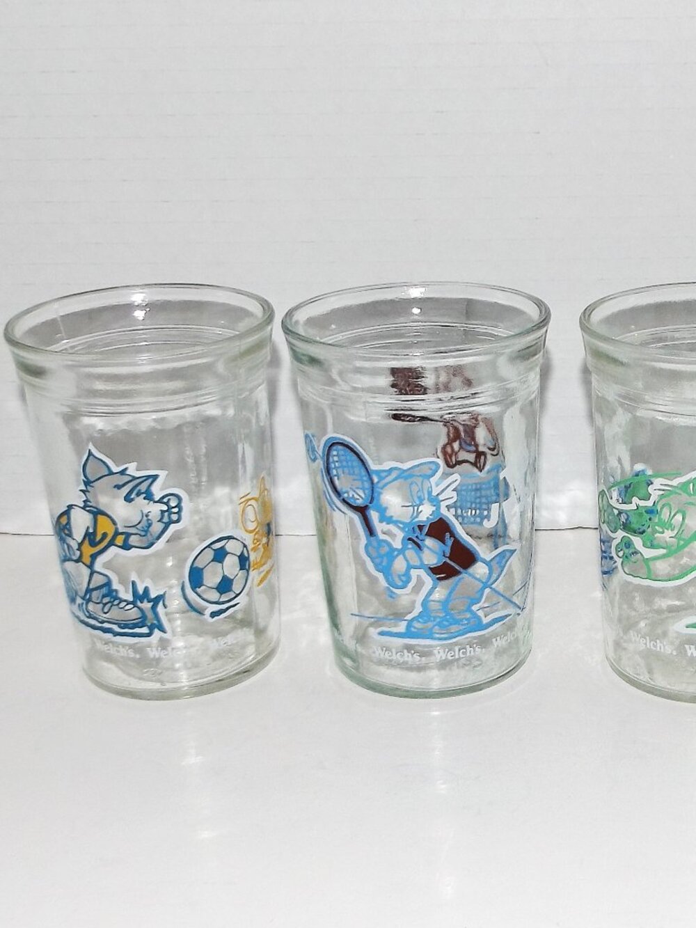 Collection of 4 Welch’s 6 oz Jelly Jar Glasses Tom & Jerry Theme 1990s